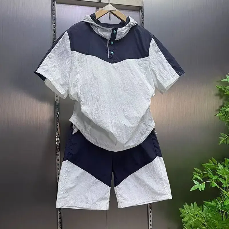Summer quick drying casual sports hooded shorts short sleeved set for men, fashionable contrasting color loose 2pcs set