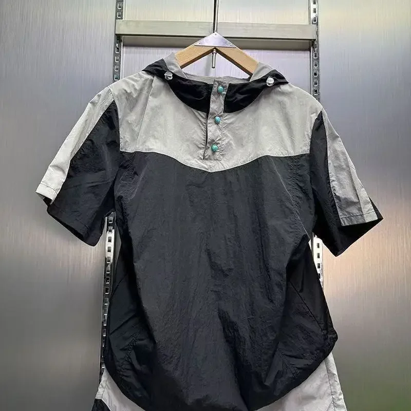 Summer quick drying casual sports hooded shorts short sleeved set for men, fashionable contrasting color loose 2pcs set